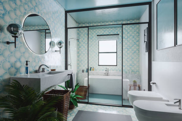 Modern bathroom with soft blue color accents and bright white finishes by an interior painter in Annapolis, MD.